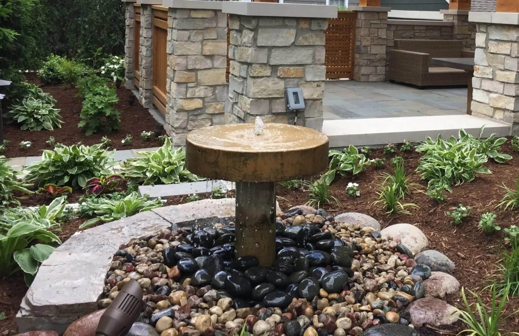 Custom patio, pergola, and fountain installation near Burr Ridge, IL