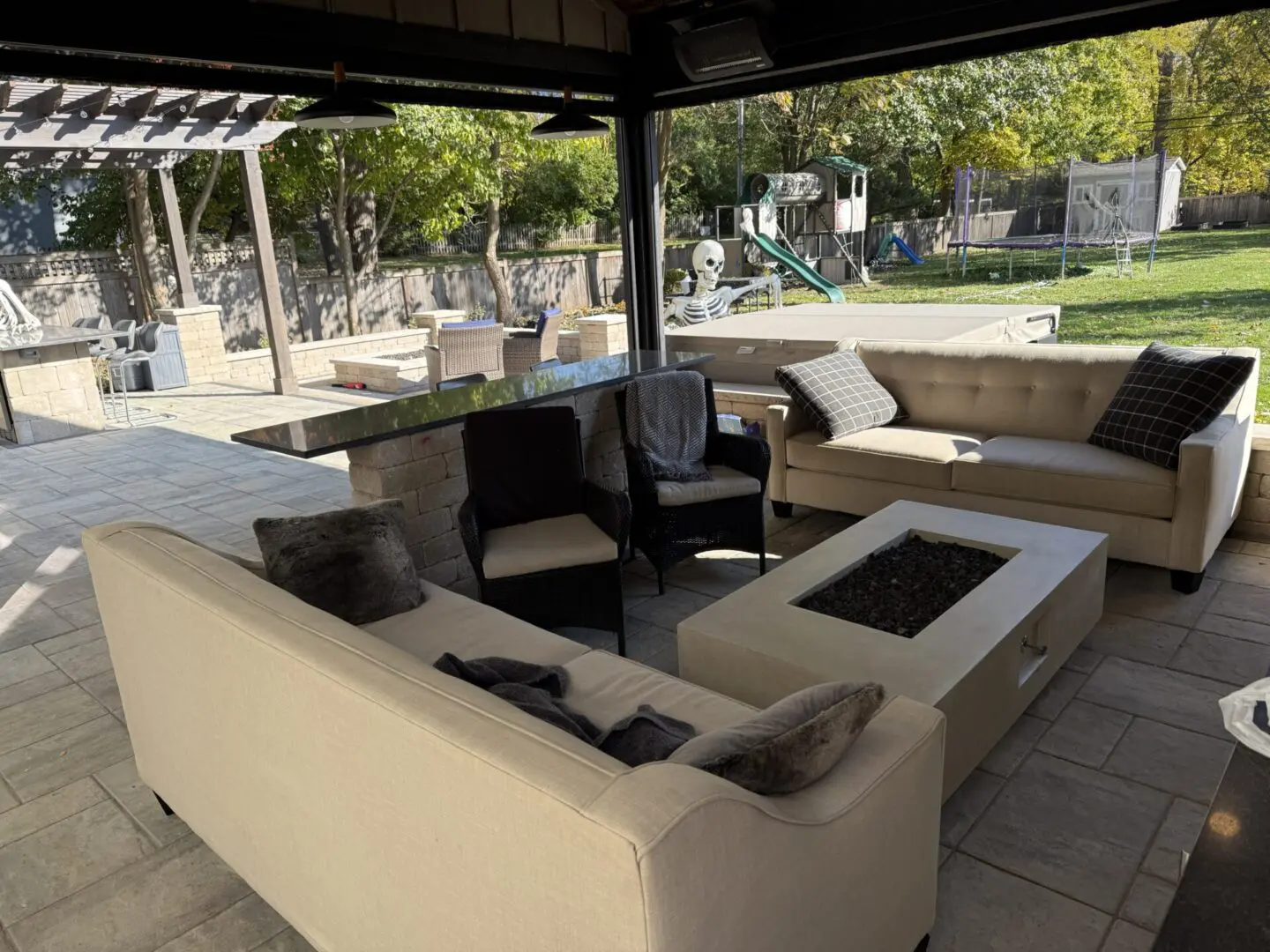 High-end luxury pavilion with bar, firepit and outdoor kitchen installation in Downers Grove, IL