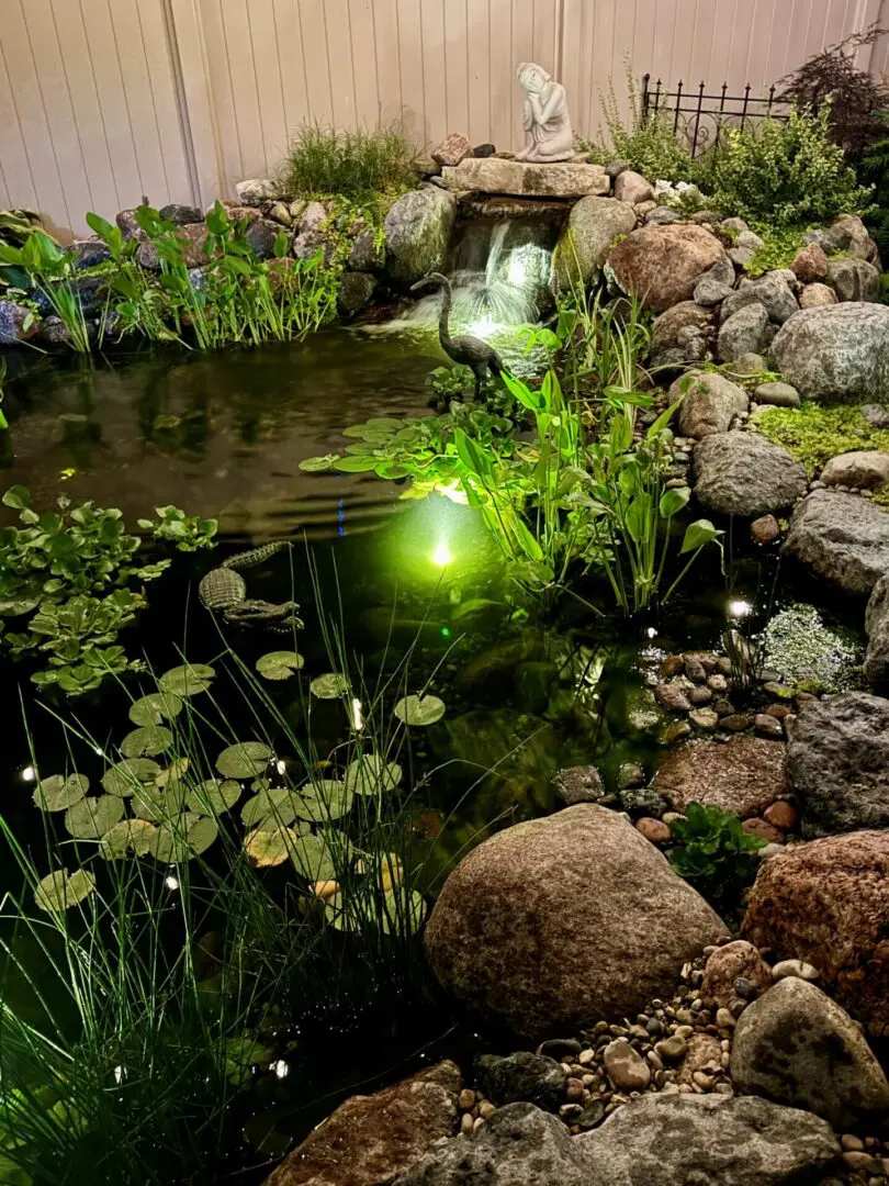 Backyard pond and waterfall installation near Downers Grove, IL