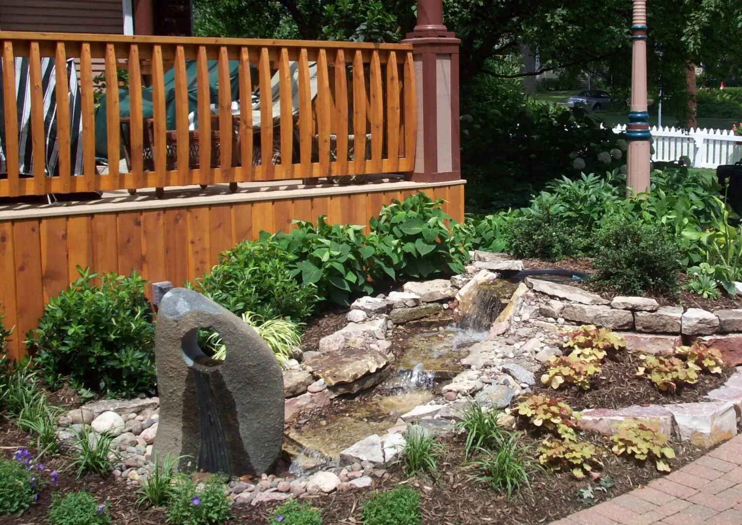 Backyard pond and waterfall installation near Downers Grove, IL