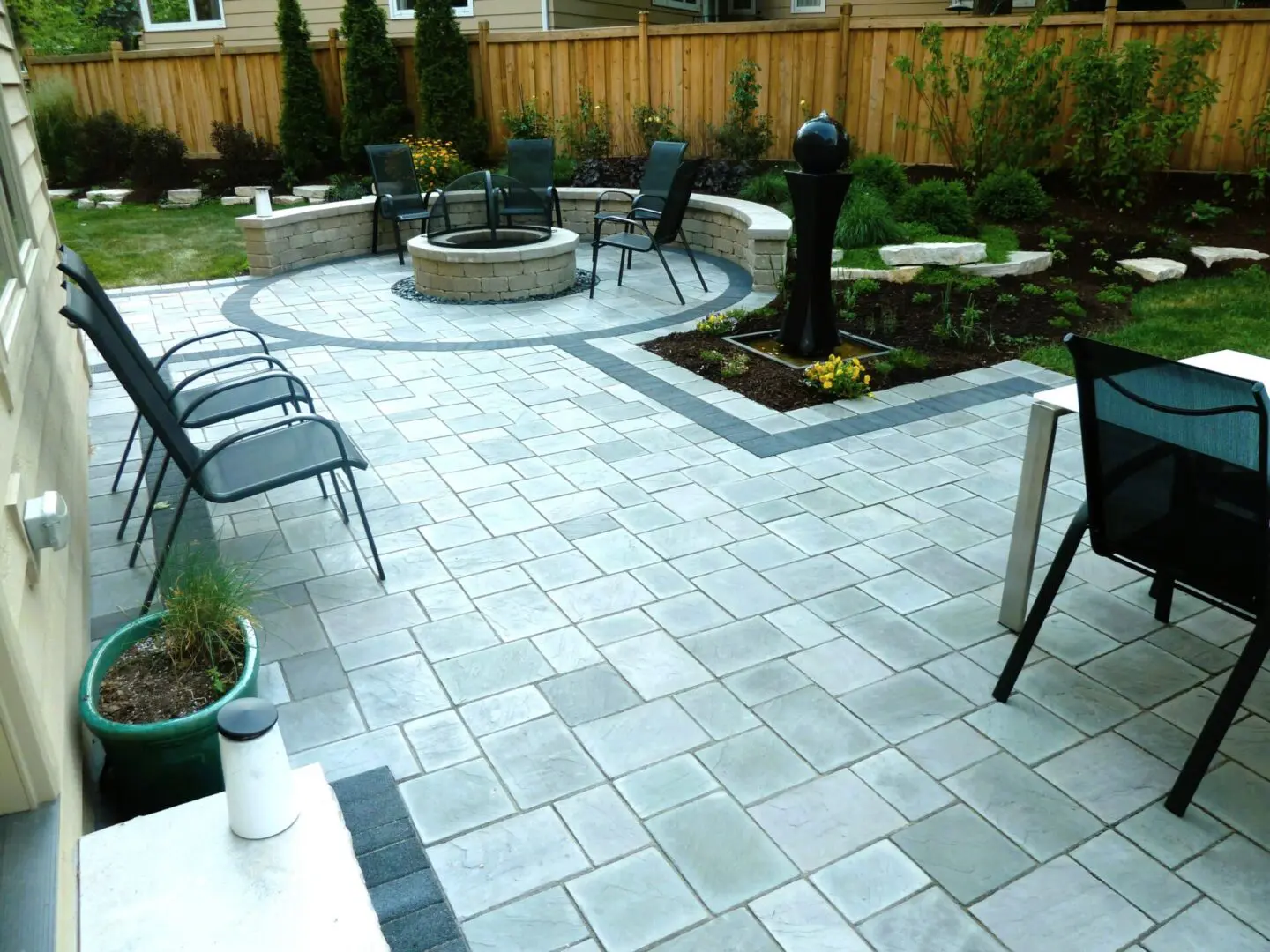 Custom paver patio with firepit installation in Glen Ellyn, IL