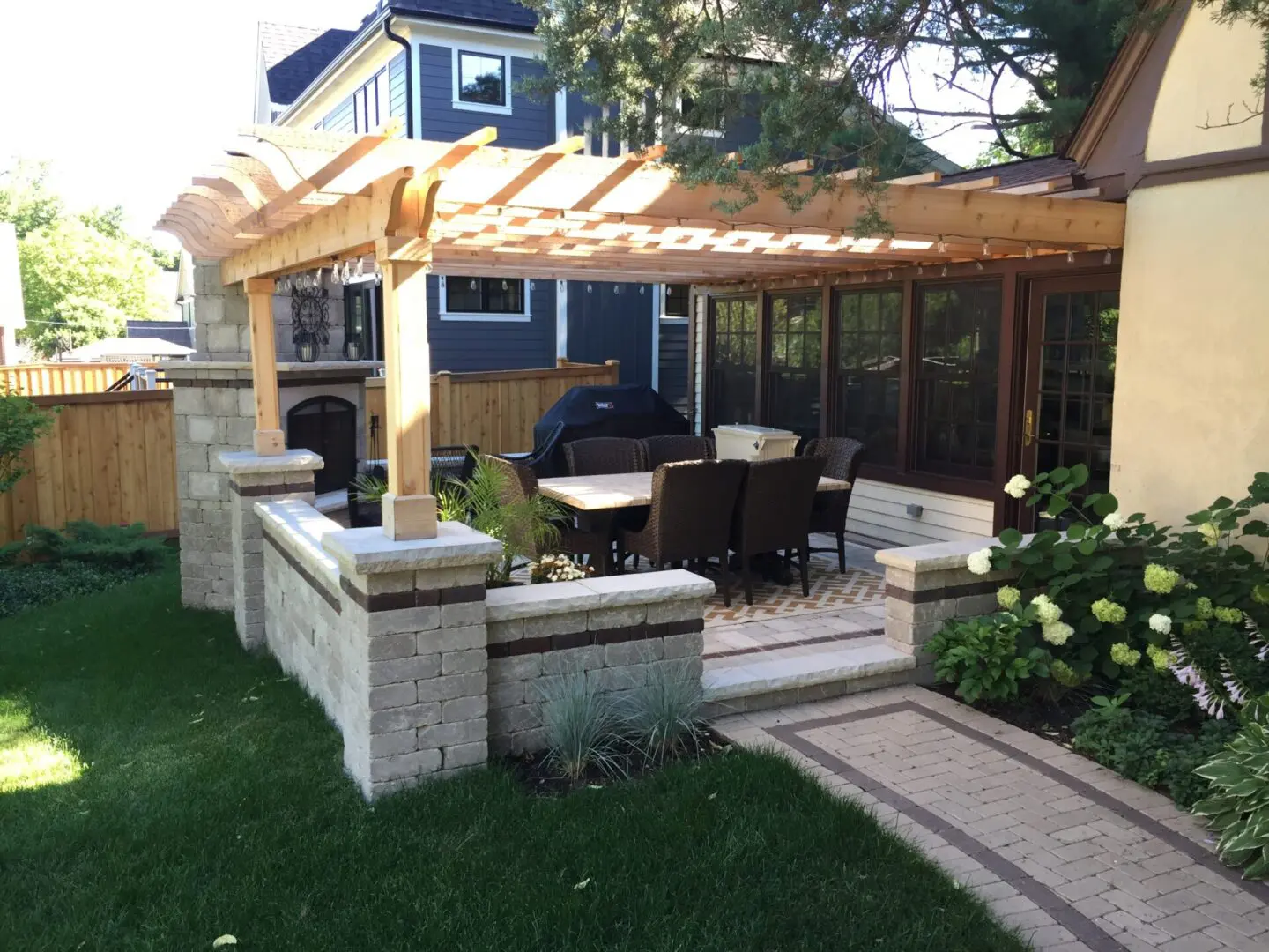 High-end outdoor pergola with seating and lighting in Hinsdale, IL