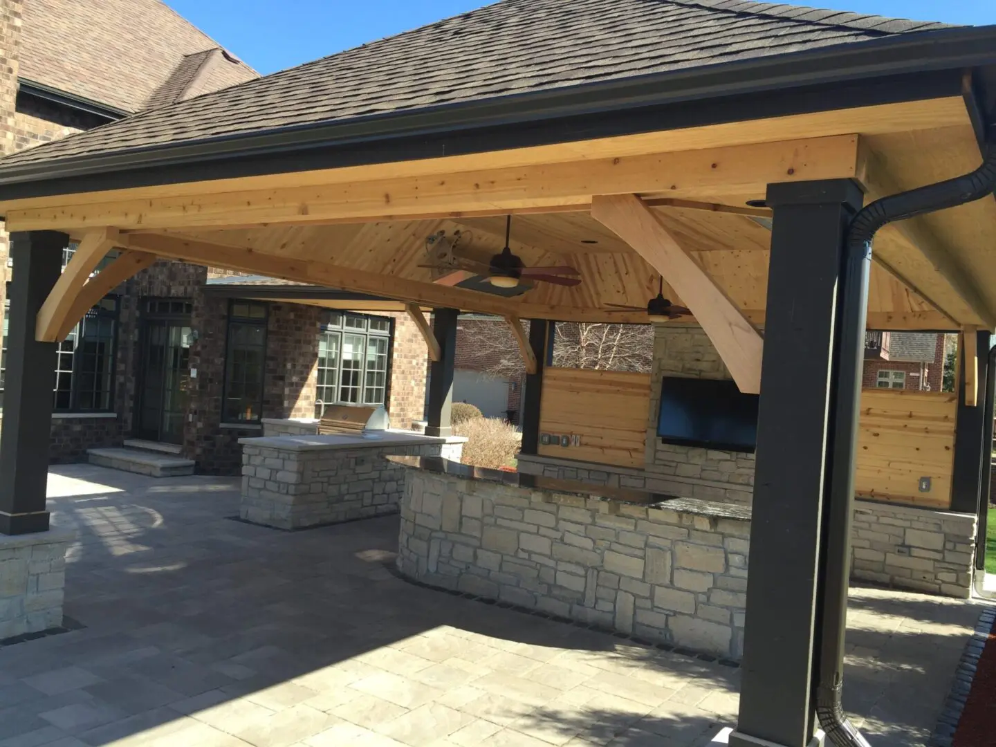 Pavilion and pergola structure in backyard outdoor living space in Lemont, IL