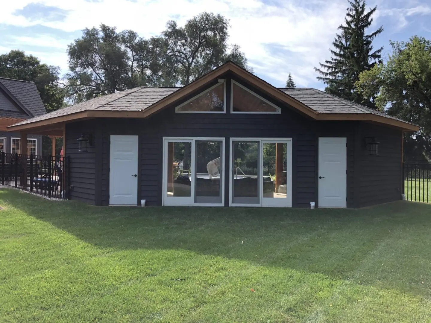 Custom outdoor roof structure with pool paver patio installation in Lisle, IL