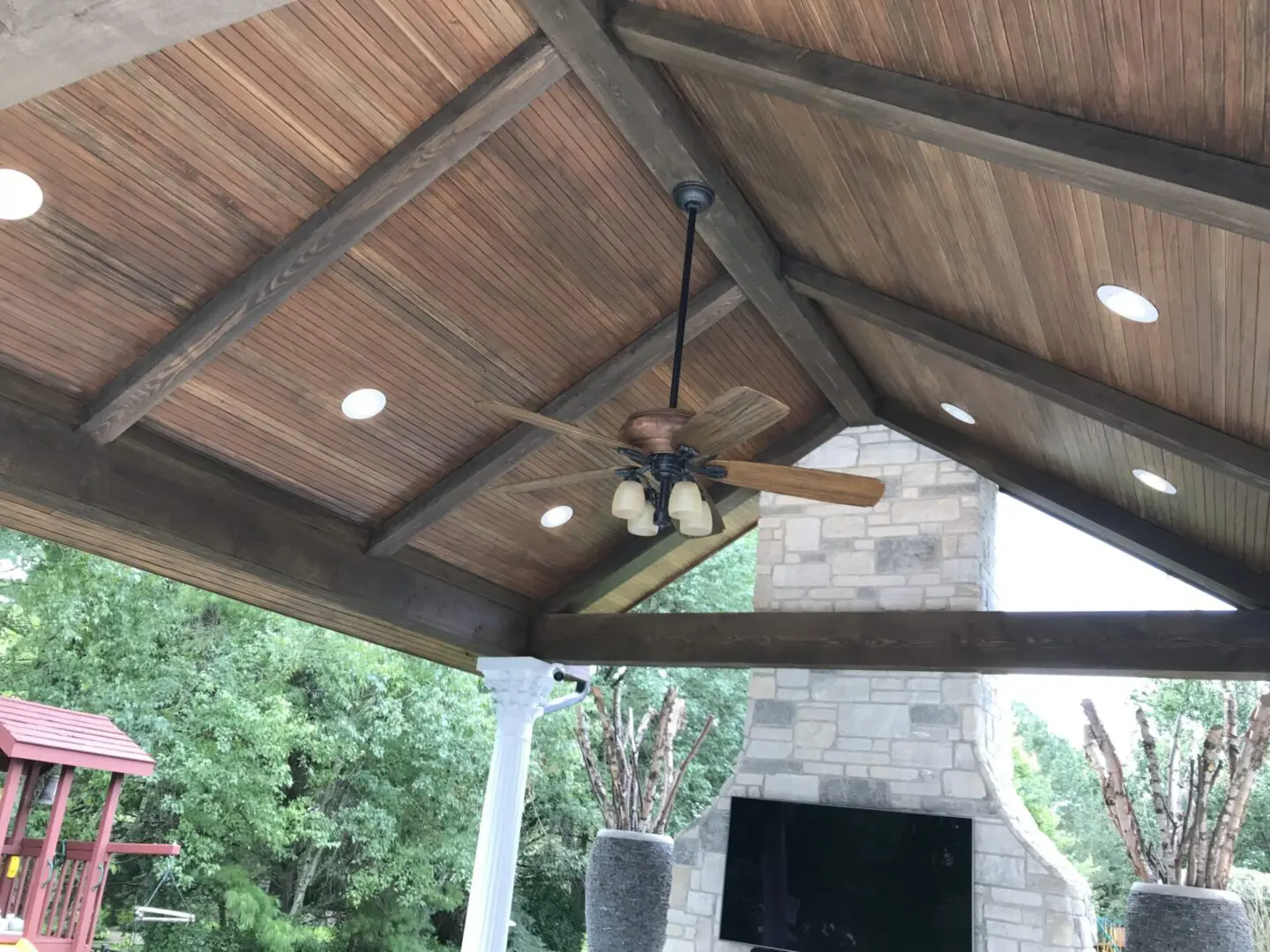 Pavilion and pergola structure in backyard outdoor living space in Naperville, IL