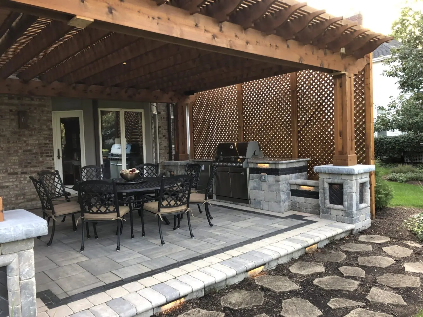 Custom wood pavilion and pergola structure in backyard outdoor living space near Lisle, IL