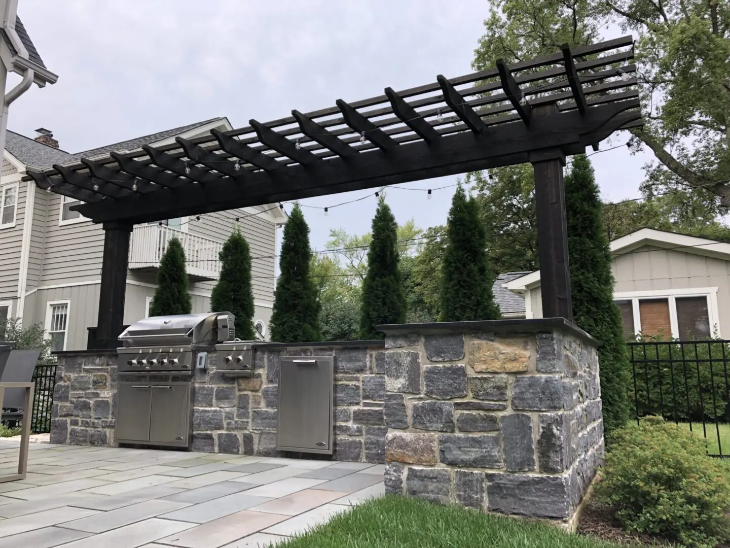 Custom pergola and outdoor kitchen installation in Naperville, IL