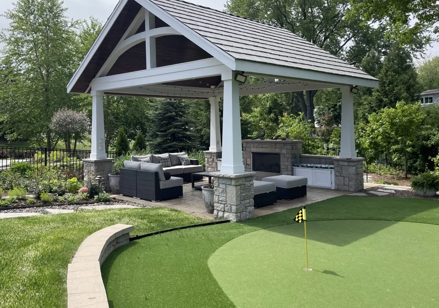 High-end outdoor pavilion with fireplace and seating area in Naperville, IL