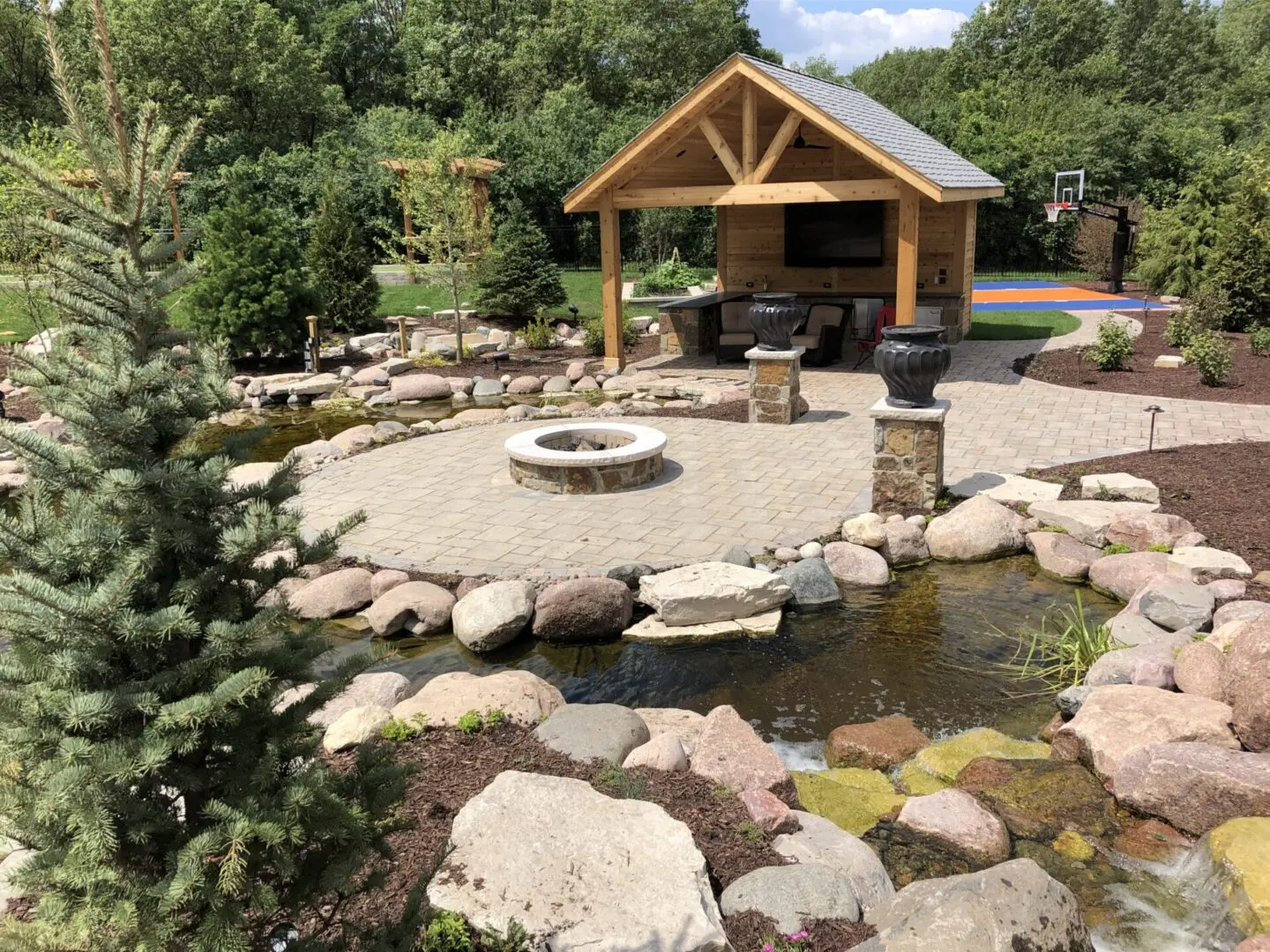Palos Park, IL paver patio with retaining walls and professional plant installation