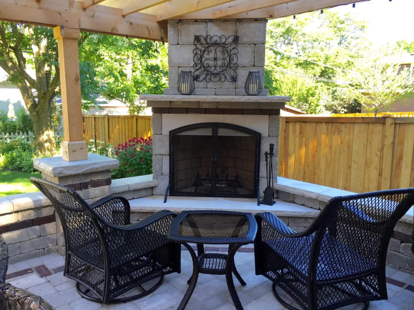 Paver patio with custom fireplace and pergola in Burr Ridge IL