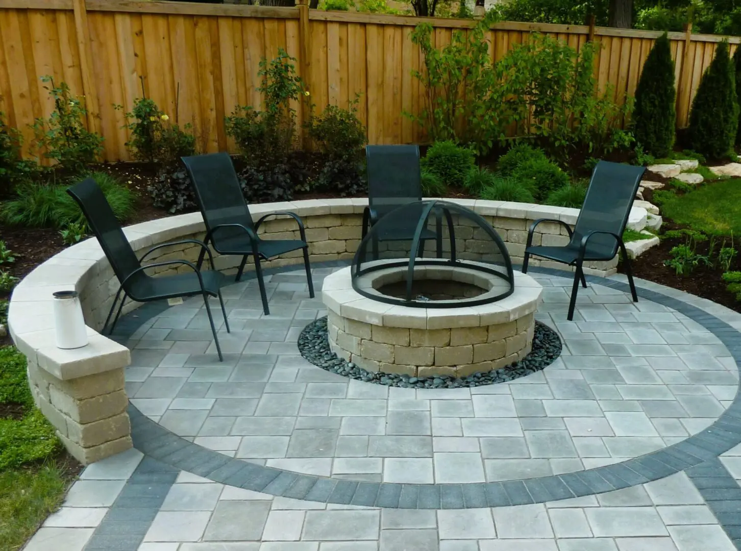 Paver patio with fire pit and seat wall in Glen Ellyn IL