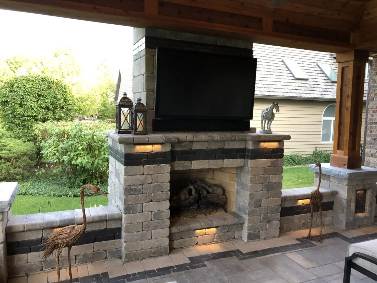 Paver patio with custom fireplace and pavilion in Naperville IL