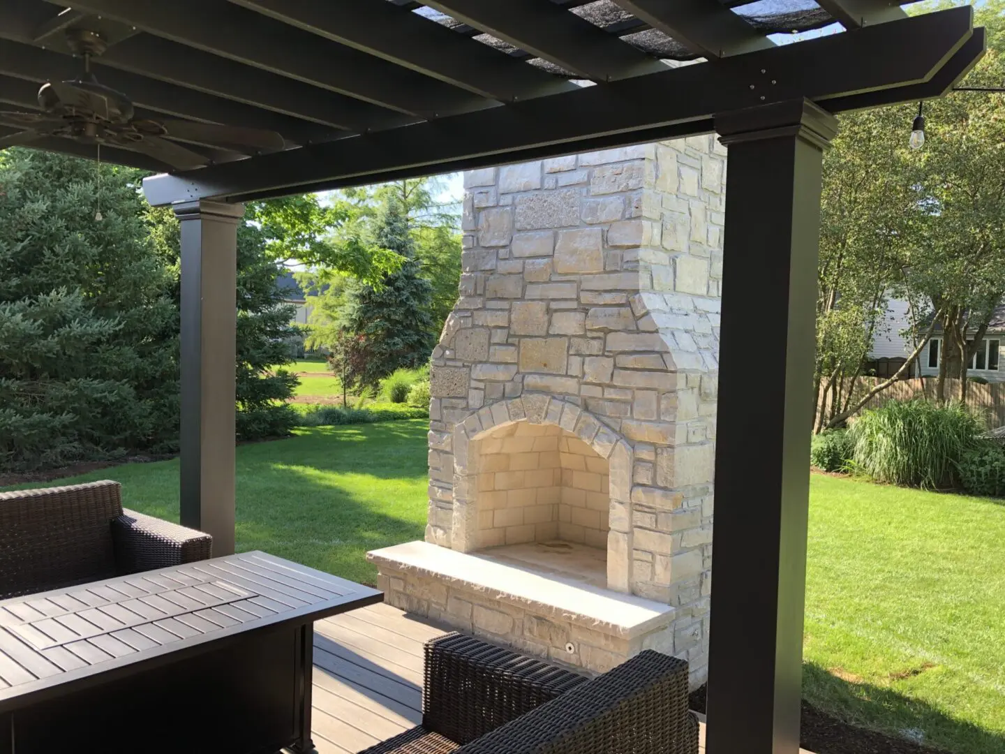 Paver patio with custom fireplace and pavilion in Glen Ellyn IL