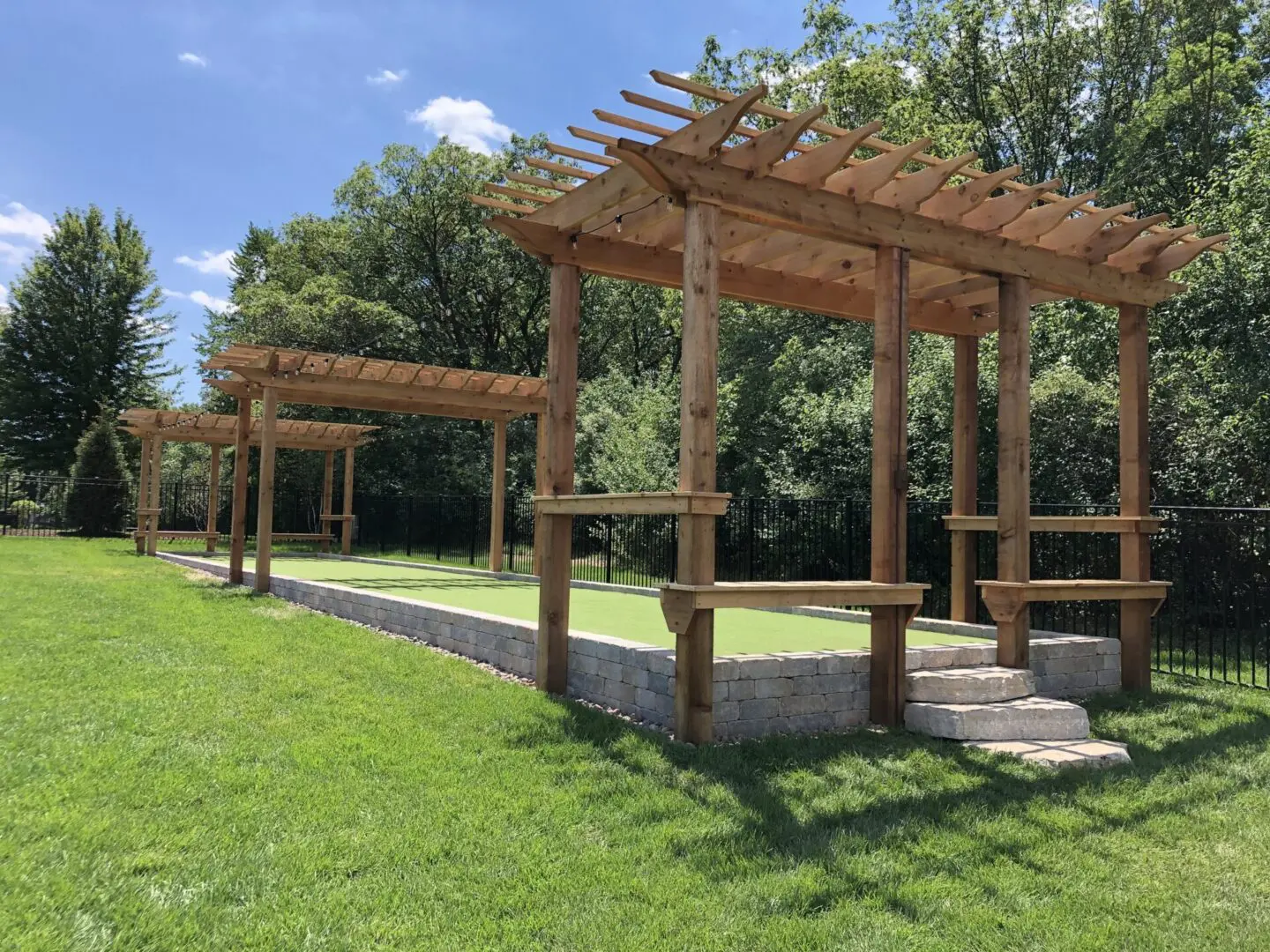 Custom bocce court with pergola installation in Palos Park, IL
