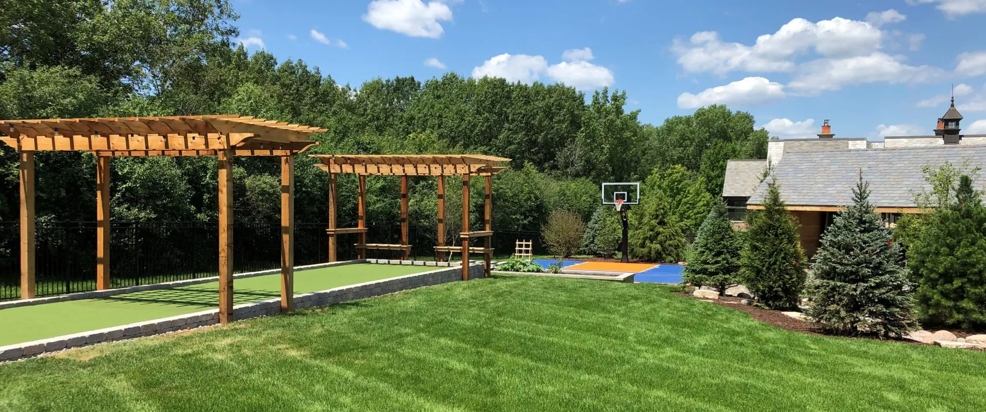 Landscape design installation with sport court in Palos Park, IL