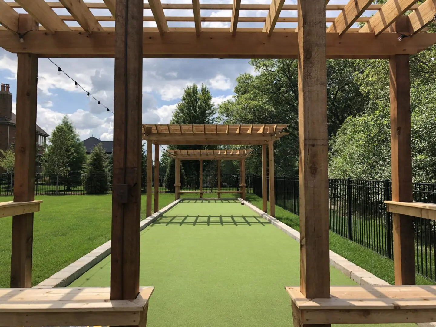 Custom pergola and bocce court installation near Palos Park, IL