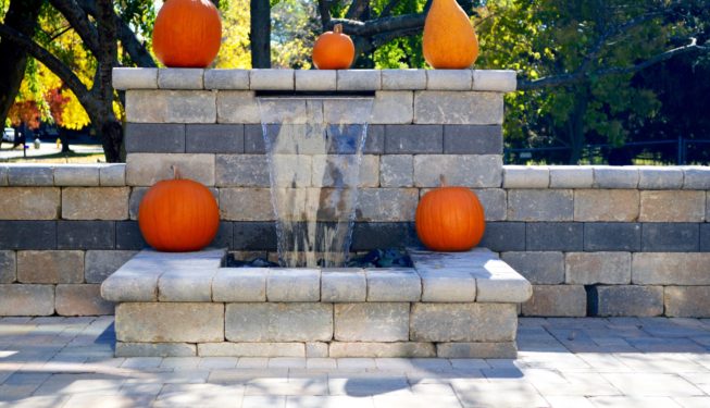 Wall water feature with pumpkin decor