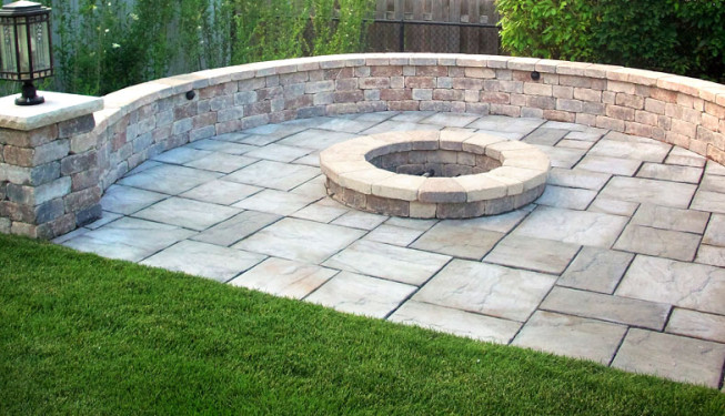 Circular outdoor firepit with lawn