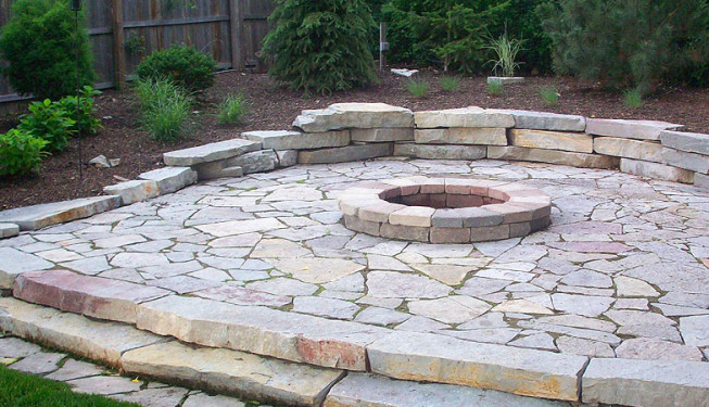 Stone mosaic outdoor fire place