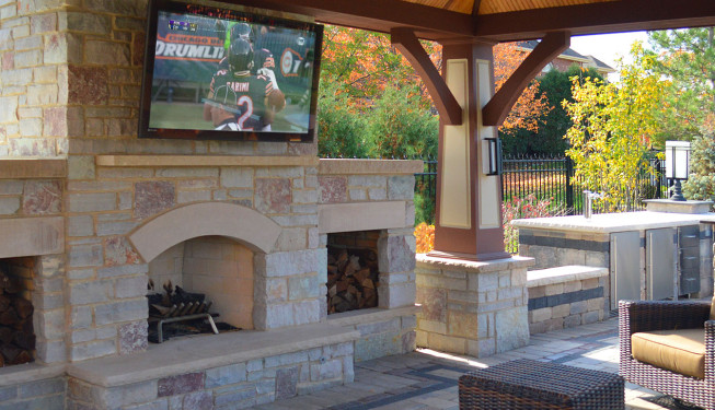Natural stone fireplace with TV