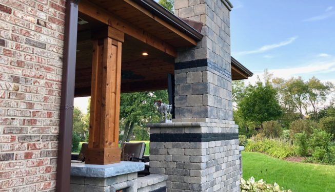 Stone outdoor fireplace with ceiling