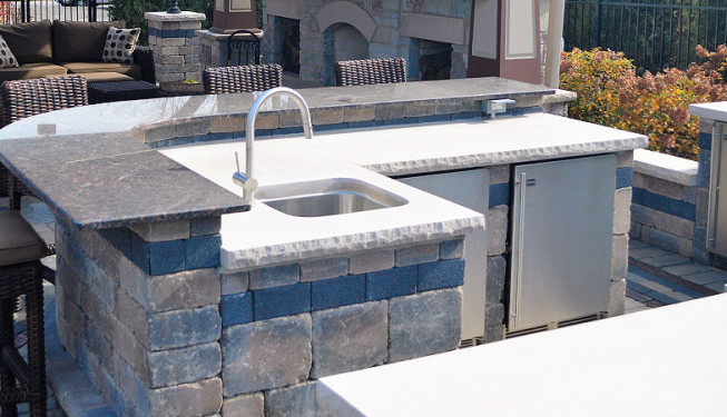 Outdoor kitchen unit with sink and storage
